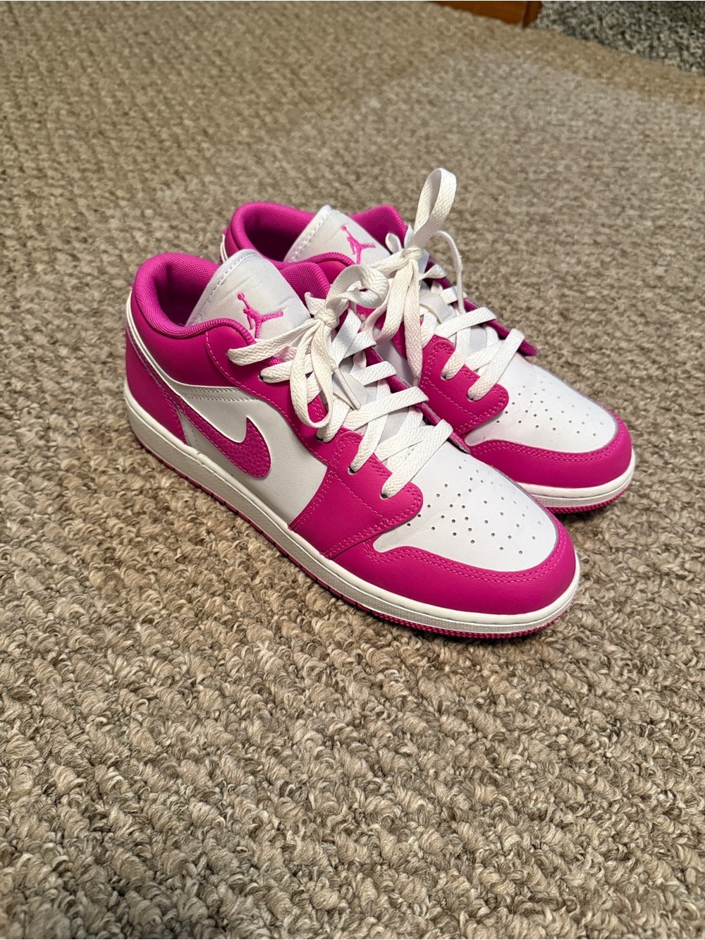 Pink and White Air Jordan 1 lows